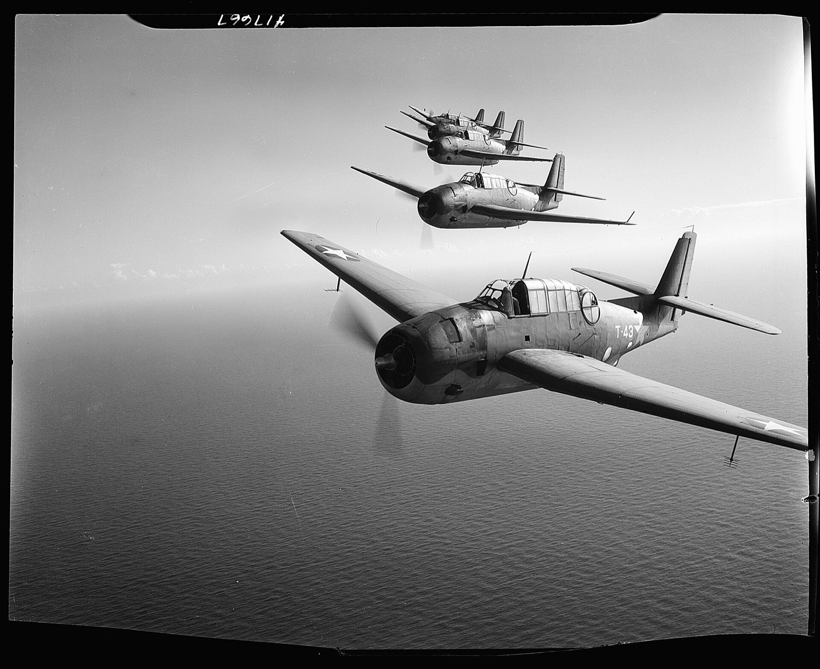 Avenger torpedo bombers flying in formation